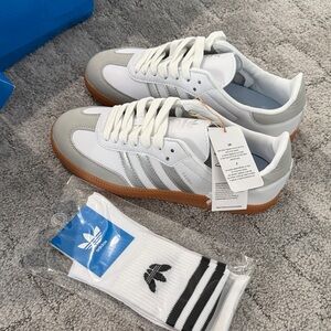 Never been worn adidas Sambas silver and white